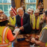 President Trump Presents Signed Hats and Challenge Coins to Crew