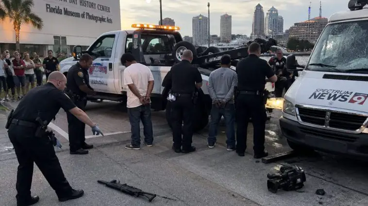 Three Arrested After Tow Truck Mob Attacks CBS Crew, Rifle Found