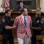 Rep. Eric Davanzo Ejected Over Flag Jacket; Speaker McClinton Rules