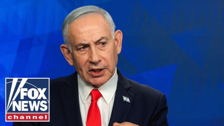 Netanyahu vows 'FORCEFUL' response to Iran attacks