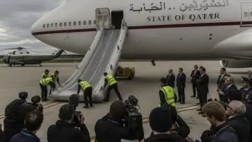 Evacuation Slide Deploys from Donated Air Force One with Trump