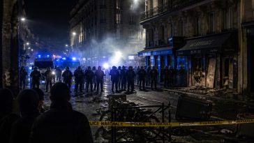 Macron Keeps Interior Minister After Riots as Curfews Sweep Cities
