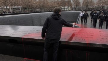 Activist Sprays Red Paint on 9/11 Memorial to Push Gun Registry